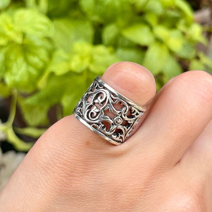 Sterling silver wide cigar band, open work filigree floral ring. Please note: Ring runs small- go up at least one size for a good fit. Size 6, 7, 8, 9 Width: 16mm Weight: 8-10g Floral Ring, Sterling Silver Filigree, Go Up, Silver Filigree, Cigars, Band Ring, Floral Rings, Band Rings, Rings For Men