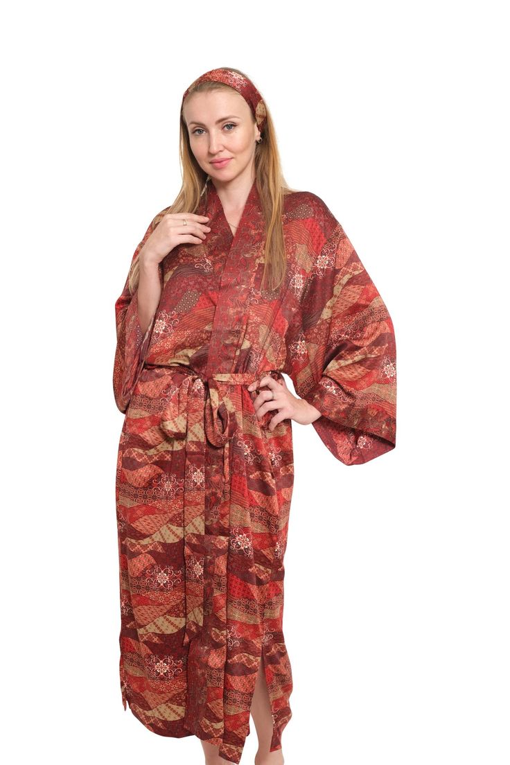 The perfect gift for anyone who loves the finer moments in life, this soft and sexy kimono robe is crafted by hand with strong attention to detail. With a gorgeous print and exclusive stitches, it's perfect for an extended variety of use. Crafted by hand with strong attention to detail which boasts the finest rayon fabric. Rayon is a versatile fabric made from purified cellulose fibers, known to take on the properties of silk.Lightweight and delicate, rayon feels like a smooth breeze on your ski Open Front Kimono For Sleep, Elegant Kimono With Kimono Sleeves For Gift, Elegant Kimono With Kimono Sleeves As A Gift, Elegant Kimono As A Gift, Fall Loungewear Robe With Kimono Sleeves, Traditional Wrap Kimono For Loungewear, Traditional Kimono Sleeve Robe For Loungewear, Traditional Long Kimono For Loungewear, Long Red Kimono For Loungewear