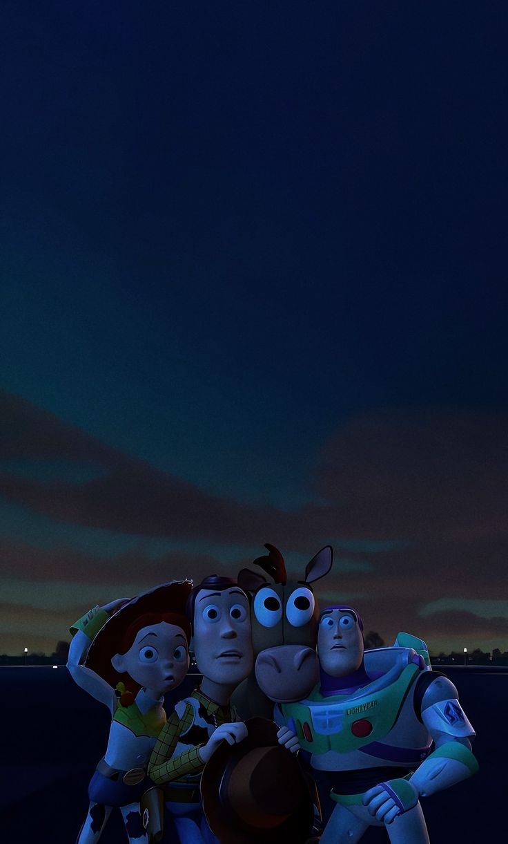 the characters from toy story are posed together in front of a dark sky at night