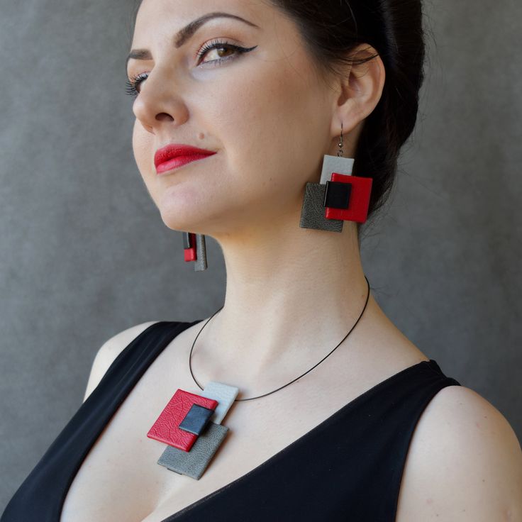 "Geometric bloom, Short necklace, Artistic necklace, geometric composition, Contemporary jewelry, Red accent necklace, Fashion collar... Minimalist artistic short necklace. Geometric composition fashion collar from geometric bloom collection. Contemporary pop art style necklace in gray shades with red accent. Necklace is available also as part of jewelry set.  Options: - Choose necklace, earrings, ring , brooch or one of sets. - Choose accent color (Pink, Red, White, Orange, Blue, Purple)  Dimen Modern Red Necklace For Party, Modern Red Necklace For Gift, Modern Red Necklace Perfect As A Gift, Modern Red Geometric Jewelry, Contemporary Pop Art, Gray Shades, Artistic Earrings, Geometric Composition, Contemporary Necklace