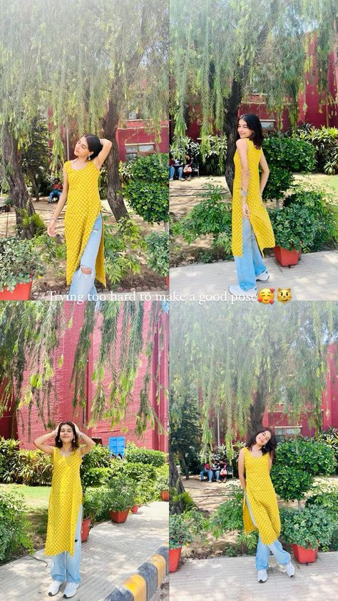 woman in yellow and blue outfit posing for the camera with her hands behind her head