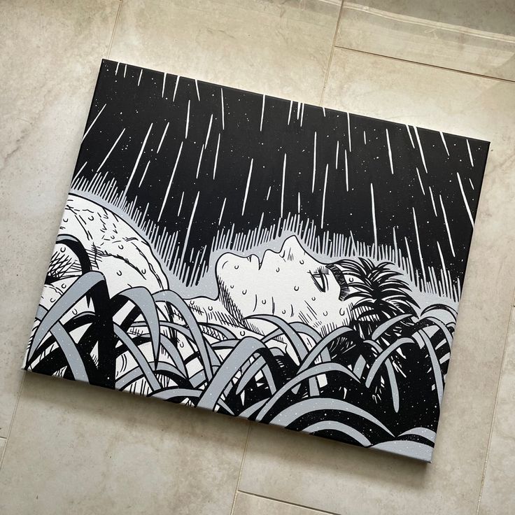 a black and white painting on a wall with rain coming down over the top of it