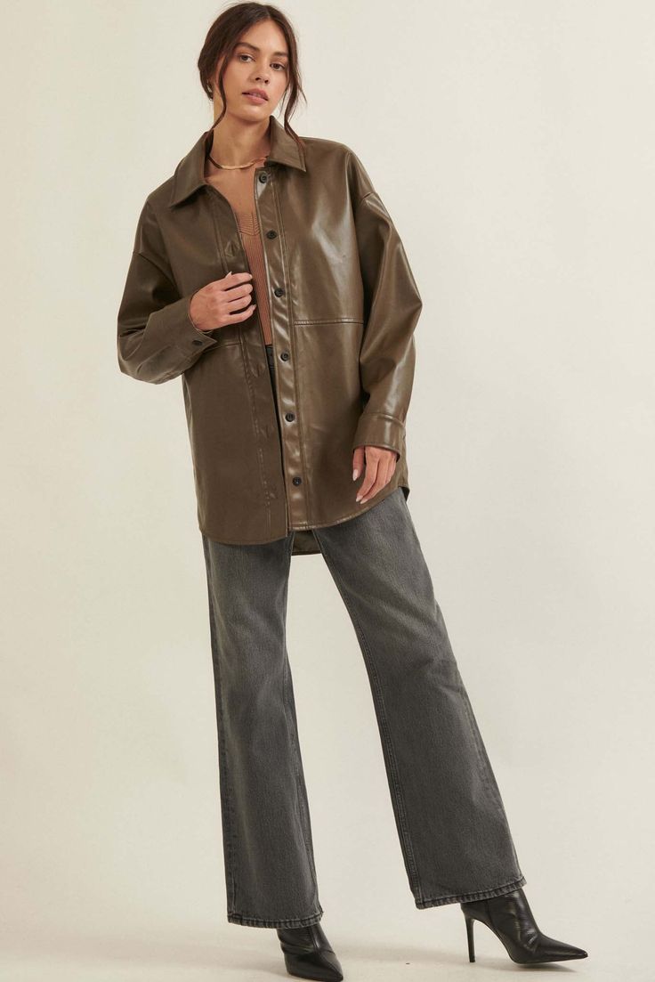 Faux leather shirt jacket. Collared neckline. Button-front closure Long sleeves with buttoned cuffs. Drop shoulder. Curved shirttail hem. Loose fit. 65% Polyester, 35% PU. Imported. Designed in LA. Model wears size S. This item is final sale. Fall Leather Jacket With Spread Collar, Brown Leather Button-up Jacket With Button Cuffs, Brown Button-up Leather Jacket With Button Cuffs, Casual Collared Leather Jacket With Buttons, Workwear Collared Outerwear With Snap Cuffs, Collared Outerwear With Snap Cuffs For Work, Casual Leather Jacket With Snap Buttons For Work, Casual Snap Button Leather Jacket, Casual Button-up Leather Jacket With Snap Buttons