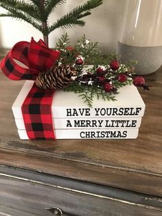 a wooden box with a christmas decoration on it and the words have yourself a merry little christmas