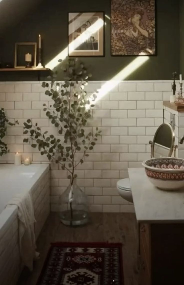 a bathroom with a sink, toilet and bathtub in the corner next to a rug