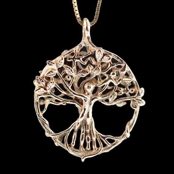 Look closely and discover the mystery and magic of this unique Circle of Life, Tree Pendant.  A male and female figure entwine to form the trunk of the tree, their feet firmly rooted to the earth and their arms raised to the heavens above. Their extended arms form the branches of the tree where 5 tiny children are nestled among the leaves. Everyone may interpret this Circle of Life Tree Pendant differently, but for me it is a symbol of our interconnection to each other and a visual prayer that t Tree Jewelry, Life Tree, Gold Dragon, Gold Medallion, Gold Tree, Solid Gold Necklace, Casting Jewelry, Tree Of Life Necklace, Tree Of Life Pendant