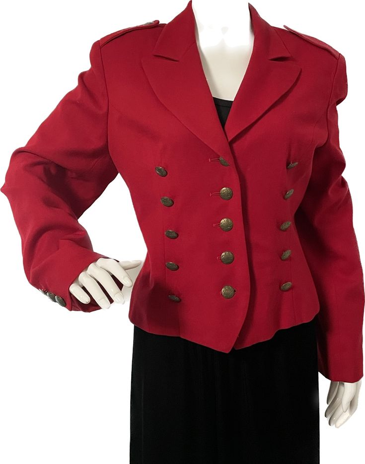 This is a wool jacket from Neiman Marcus exclusive, made in the USA.  The double breasted jacket has three rows of buttons down the front, also three buttons on each cuff and one on each epaulette. The jacket is fully lined with red acetate and has shoulder pads.   A fun way to add a pop of color and interest to your denim or a LBD.  Size tag 10, check measurements carefully, no stretch.  Some verdigris on one of the sleeve buttons, otherwise no flaws noted.   Measurements taken with jacket layi Formal Cropped Jacket With Buttons For Fall, Wool Cropped Jacket With Buttons, Formal Double-breasted Cropped Jacket, Formal Double-breasted Cropped Jacket With Buttons, Classic Wool Cropped Jacket With Buttons, Fitted Double-breasted Cropped Jacket With Buttons, Fitted Cropped Jacket With Double Button For Winter, Winter Double-breasted Cropped Jacket, Formal Double-breasted Cropped Winter Jacket