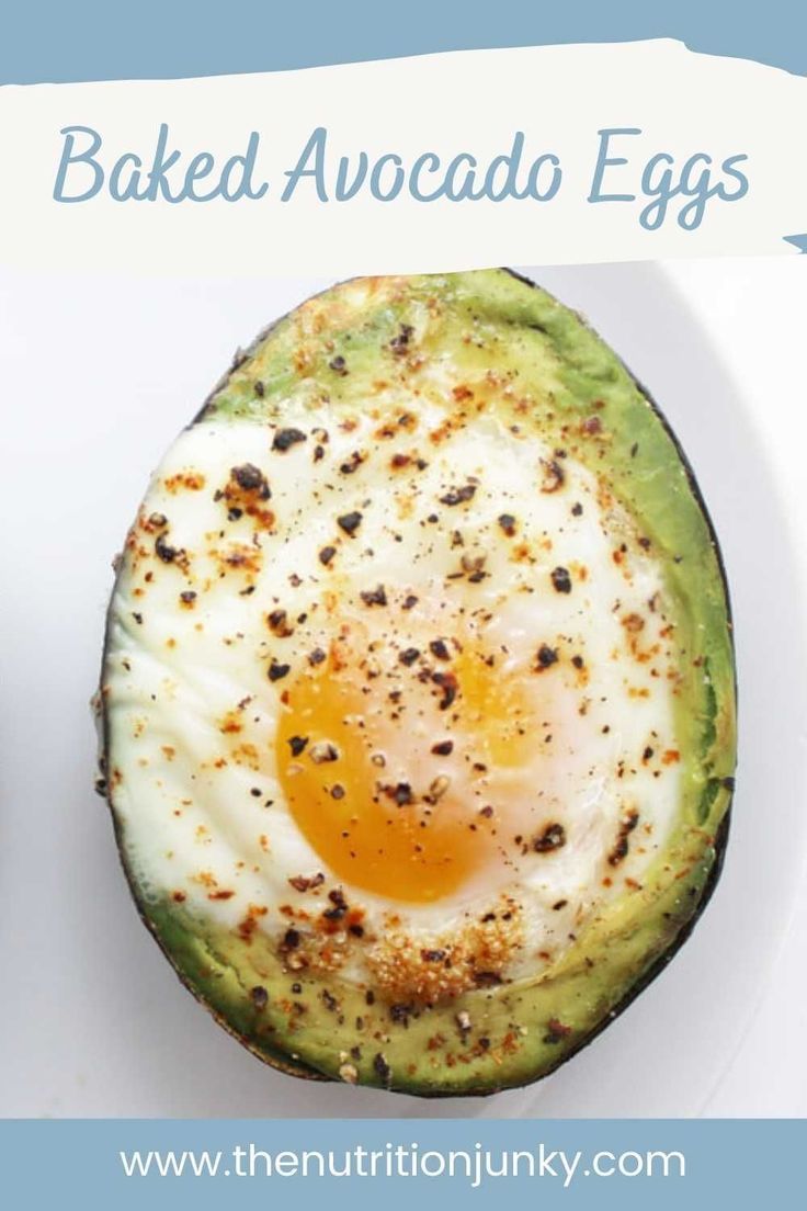 an avocado with eggs on it and the words baked avocado eggs