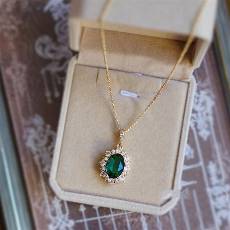 Luxury Green Emerald Statement Necklace, Luxury Gold Plated Green Emerald Necklace, Luxury Emerald Pendant Gemstone, Luxury Necklaces With Stones For Gift, Luxury Emerald Pendant Necklace For Wedding, Luxury Green Pendant Jewelry Sets, Luxury Handmade Emerald Necklace, Luxury Green Pendant Bridal Necklace, Luxury Classic Emerald Pendant Necklace