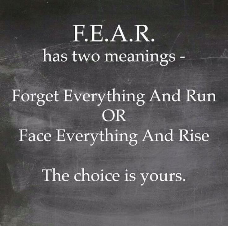 a sign that says fear has two meaningss forget everything and run or face everything and rise the choice is yours