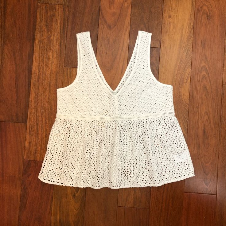 American Eagle Outfitters White Sleeveless Eyelet Top V-Neck, Babydoll Style Top Eyelet Pattern, See-Through Size M Nwt White V-neck Camisole For Vacation, White V-neck Vest Top, Summer V-neck Tank Top For Daywear, Fitted V-neck Summer Vest, Spring Cotton Lace Top With V-neck, Summer Cotton V-neck Vest, White V-neck Tank Top For Vacation, Summer White V-neck Vest, White V-neck Summer Vest