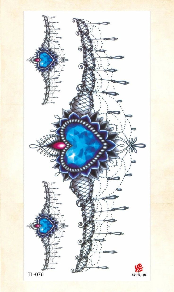 an artistic tattoo design with blue and black designs on white paper, including the shape of a