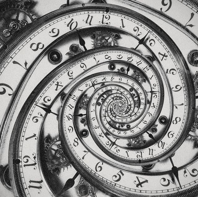 an intricate spiral design is shown in this black and white photo, with the time being 11 30