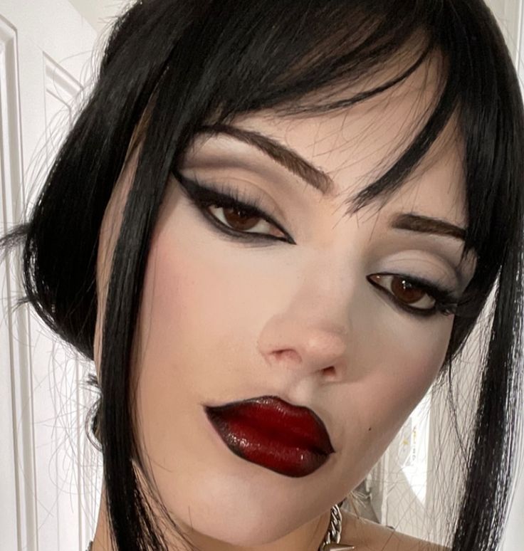 Red Lipstick Goth Makeup, Hollywood Style Makeup, Dark And Moody Makeup, Vampire Makeup Dark Skin, Black And Red Lip Combo Makeup Look, Morticia Inspired Makeup, Different Aesthetics Makeup, Vampire Hair And Makeup, Vampire Makeup Asian