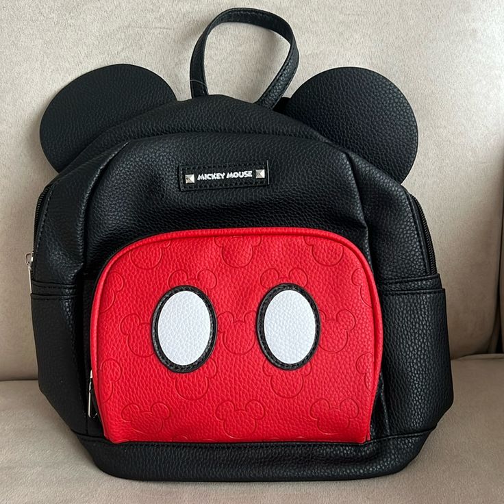 Perfect For You Or For A Mickey Mouse Fan. Black Minnie Mouse Bag For Back To School, Casual Black Backpack For Disney Trips, Minnie Mouse Backpack For Disney Fan Events, Black Minnie Mouse Backpack For Back To School, Black Minnie Mouse Standard Backpack, Red Minnie Mouse Standard Backpack, Back To School Minnie Mouse Black Backpack, Red Mickey Mouse Backpack, Black Mickey Mouse Backpack