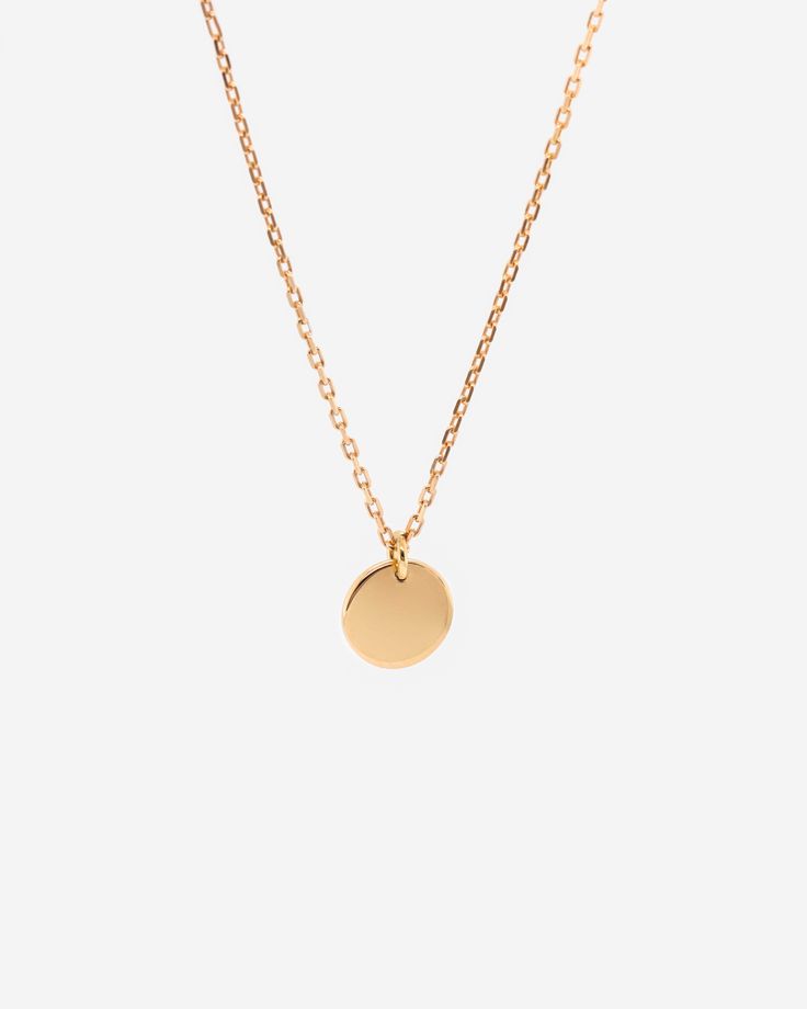 This simply elegant disc pendant necklace is handcrafted in vermeil, a thick 18K gold layer on solid 925 sterling silver. It is sturdy for everyday wear. This versatile necklace can be worn beautifully alone or layered with other necklaces. _____________________________________ D E T A I L S : ▪ Disc Diameter - 10mm▪ Model Wears - 45cm/17.7 inches▪ 18K Gold Vermeil Necklace▪ Base Metal - Solid 925 Sterling Silver▪ Hypoallergenic▪ Shipped from Berlin▪ Orders to the US - No Customs Fees Upon the D Minimalist Everyday Coin Necklace With Round Pendant, Yellow Gold Round Disc Necklace For Everyday, Everyday Yellow Gold Round Disc Necklace, Gold Plated Coin Necklace, Everyday Round Disc Gold Plated Necklace, Everyday Gold Plated Round Disc Necklace, Minimalist Gold Plated Round Disc Necklaces, Minimalist Gold Plated Round Disc Necklace, Minimalist Yellow Gold Coin Necklace With Round Pendant