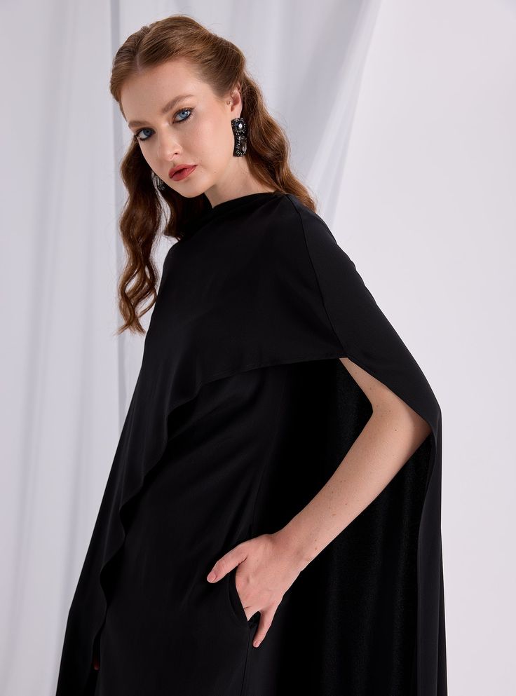 WF ATELIER Black Two-piece Dress and Cape, you can style separately with different outfıt Model height: 177 CM 100% Viscose Length: 137 cm Cape Long sıde :145 cm Chic Evening Dresses With Cape Sleeves, Chic Cape Evening Dress, Chic Cape Sleeves Midi Cocktail Dress, Elegant Black Draped Blouse, Elegant Draped Asymmetrical Dress For Fall, Chic Party Midi Dress With Cape Sleeves, Elegant Asymmetrical Draped Dress For Fall, Elegant Draped Asymmetrical Fall Dress, Chic Midi Dress With Cape Sleeves For Cocktail