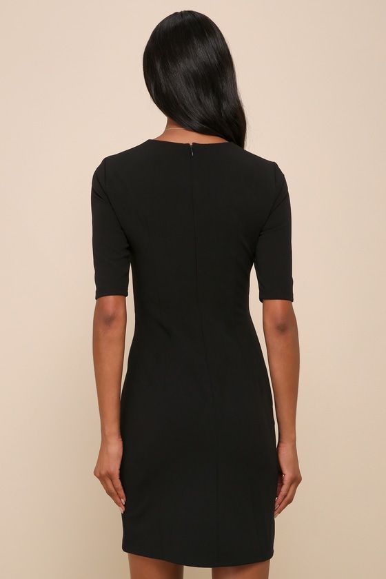 Sass and class come together perfectly with the Lulus Westwood Black Half Sleeve Sheath Dress! Ponte knit shapes this perfect-for-work dress with half sleeves, crew neckline, and princess-seamed bodice. Fitted waist tops a flattering sheath skirt with front pleats and overlapping hem. Hidden back zipper/clasp. Fit: This garment fits true to size. Length: Mid-thigh. Size medium measures 36.5" from shoulder to hem. Bust: Great for any cup size. Waist: Fitted - stretchy fabric allows custom fit. Hi Elegant Fitted Mini Dress With Half Sleeves, Formal Fitted Mini Dress With Half Sleeves, Formal Fitted Mini Dress With 3/4 Sleeves, Fitted Half Sleeve Mini Dress For Evening, Fitted Mini Dress With Half Sleeve For Evening, Fitted Short Sleeve Crew Neck Dress, Fitted Crew Neck Short Sleeve Dress, Short Sleeve Dresses With Flattering Cut For Work, Fitted Crew Neck Mini Dress For Work