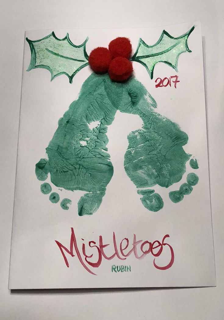 a handprinted christmas card with holly berries