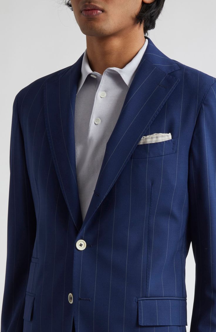 Slim pinstripes amplify the sophisticated polish of this Italian-crafted suit impeccably tailored of a stretch-enhanced blend of wool and silk. Jacket has front button closure; notched lapels; chest welt pocket; front flap pockets; ticket pocket Pants have zip fly with hook-and-bar closure; front slant pockets; back welt pockets 87% wool, 9% silk, 4% elastane Dry clean Made in Italy Designer Clothing Silk Jacket, Pocket Pants, Blue Suit, Welt Pockets, Flap Pocket, Welt Pocket, Wool Blend, Designer Clothing, Top Brands