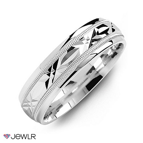 a white gold wedding band with engraved design