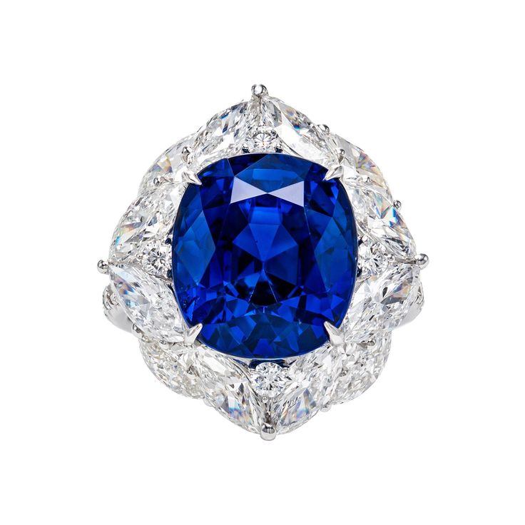 This Vihari Jewel ring features a natural 11.58 carat Royal Blue cushion cut Sapphire from Sri Lanka (GRS Certificate #2020-082763) with no artificial heating. GRS describes the colour as naturally "vivid blue." The sapphire is surrounded by 12 marquise shaped diamonds totaling 3.77 carats (F color, VS+ clarity). The total carat weight of the ring is 15.35 carats. Current ring size = US 5.5 / UK K 1/2 / SWITZ 10.5 / JPN 10 / HK 12 Purchase includes complimentary ring resizing, Vihari Jewels ring Emerald Cut Diamond Earrings, Pear Shaped Diamond Ring, Blue Sapphire Diamond Ring, Marquise Shape Diamond, Yellow Diamond Rings, Dream Party, Sapphire And Diamond Ring, White Diamond Ring, Jewels Rings