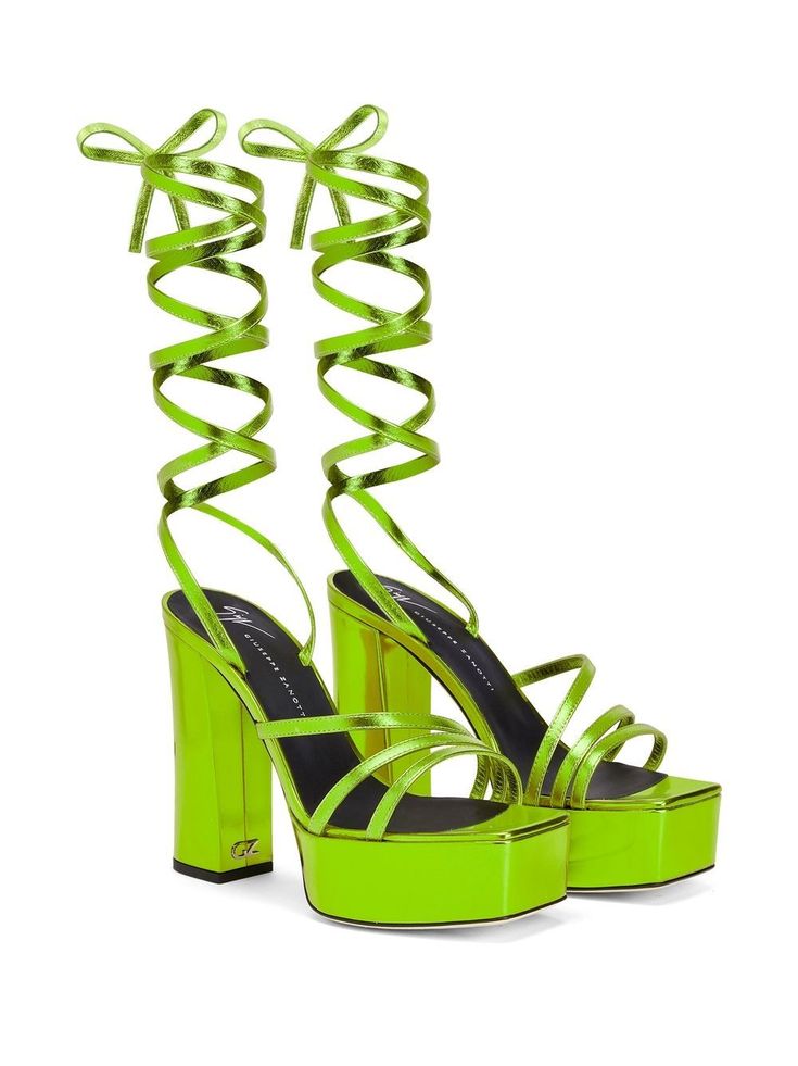 Flavienne gladiator 120mm sandals from Giuseppe Zanotti featuring lime green, leather, laminated finish, branded leather insole, open toe, lace-up detailing, platform sole and high block heel. Size Info IT Color Detail Green Made In Italia Material Sole: Leather 100% Outer: Leather 100% Lining: Leather 100% Season One Spring-Summer Season Two Spring-Summer Product sandals Brand Giuseppe Zanotti Size And Fit Heel 4,7 in / 12 cm Chic Green High Heel Lace-up Sandals, Green Lace-up Sandals With Wrapped Heel, Green High Heel Lace-up Sandals For Party, Chic Green Lace-up Sandals With Heel Strap, Modern Green Sandals For Party, Chic Green Lace-up Sandals For Party, Green High Heel Lace-up Sandals With Wrapped Heel, Chic Green Lace-up Sandals With Wrapped Heel, Luxury Green Heels For Spring