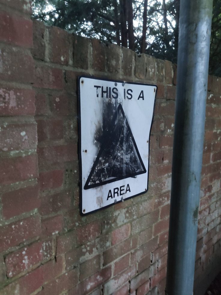 this is a area sign on a brick wall