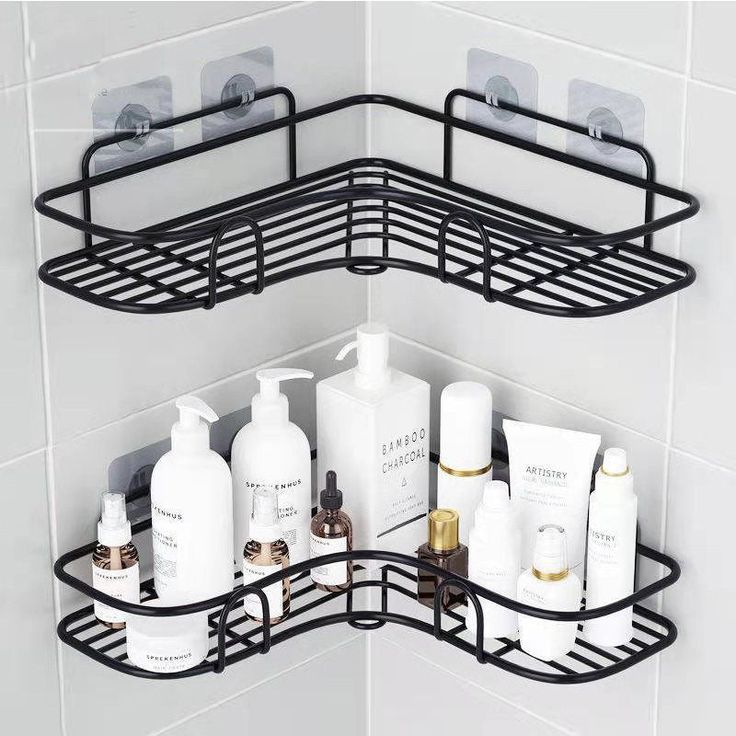 a corner shelf with several bottles and soaps on it in a bathroom area that is tiled