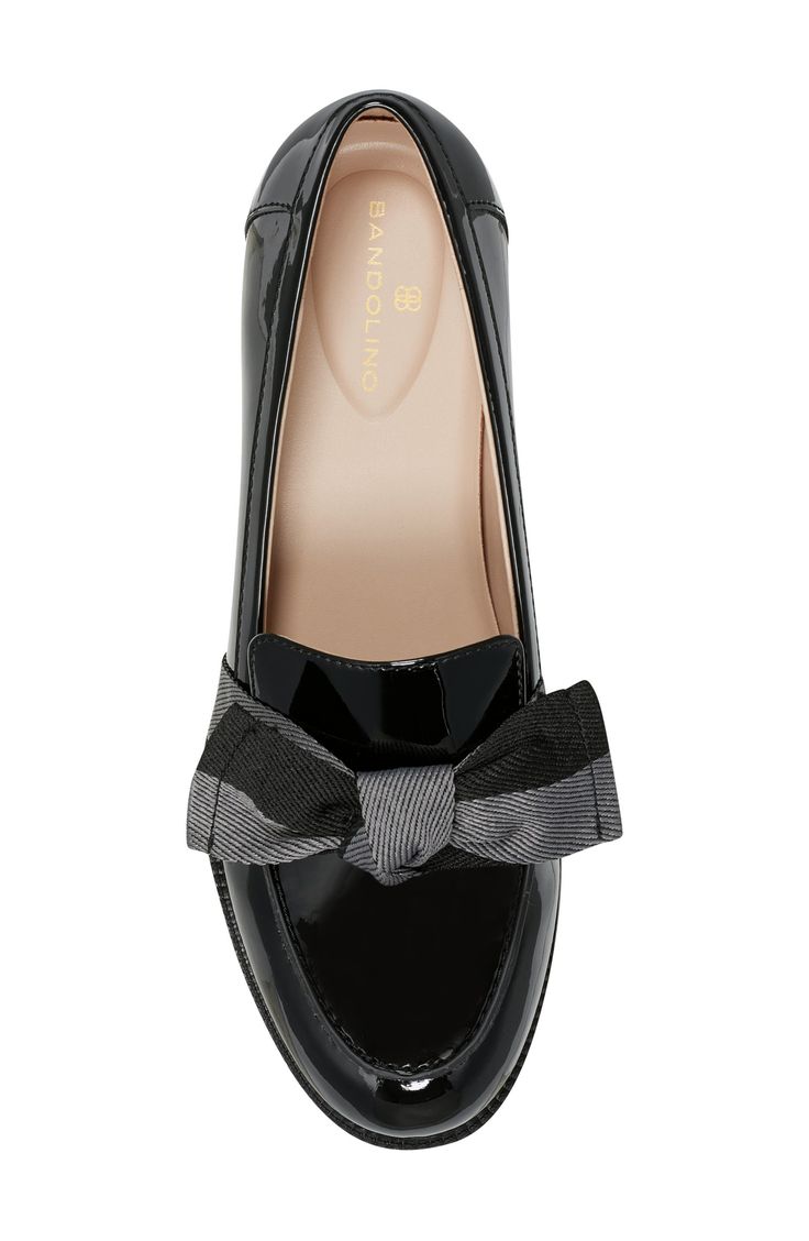 A sophisticated bow details the vamp of a slip-on loafer for a casual chic attire. Sizing: True to size. M=standard width. 1" heel Round apron toe Bow detail Slip-on Synthetic upper, manmade sole Imported Formal Slip-on Heels With Bow, Elegant Spring Platform Loafers For Office, Black Low Heel Platform Loafers For Formal Occasions, Elegant Flat Platform Loafers For Work, Elegant Slip-on Flats With Bow, Chic Slip-on Platform Loafers For Office, Elegant Slip-on Flat Platform Loafers, Elegant Patent Leather Platform Loafers For Spring, Chic Flat Platform Loafers For Formal Occasions