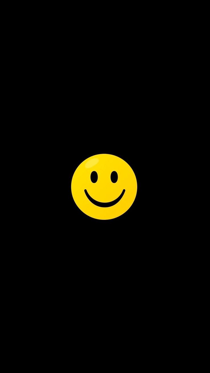 a yellow smiley face on a black background