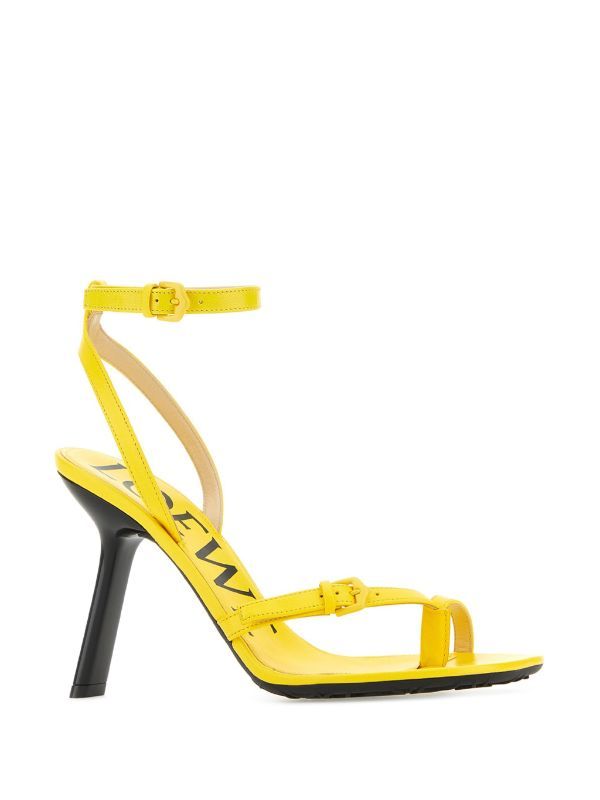 LOEWE Petal 90mm Sandals - Farfetch Yellow High Heel Sandals With Sculpted Heel, Yellow Sandals With Sculpted Heel For Evening, Yellow Evening Sandals With Sculpted Heel, Yellow High Heel Sandals With Heel Loop, Yellow Open Heel Shoes With Heel Loop, Yellow Sandals With Sculpted Heel For Formal Occasions, Yellow Formal Sandals With Sculpted Heel, Modern Yellow High Heel Sandals, Designer Yellow Sandals With Ankle Strap