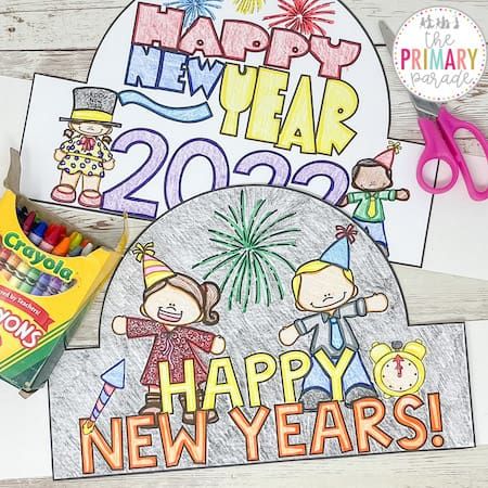 new year's coloring pages with candy and crayons on the table next to them