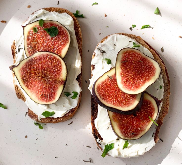 an open face sandwich with figs and cream cheese