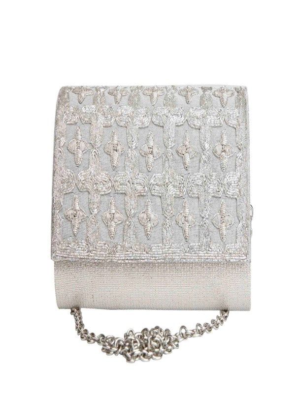 A silver clutch is a must-have in one's closet, so grab this one before it's sold. Composition: Raw Silk Size: 7 " x 4.5 " x 1" Unique Work: Hand-embroidered Ready to Ship within 10-15 days Silver Clutch, Beaded Handbag, Silver Lining, Best Deal, Raw Silk, Michael Kors Monogram, Hand Embroidered, Composition, Size 7