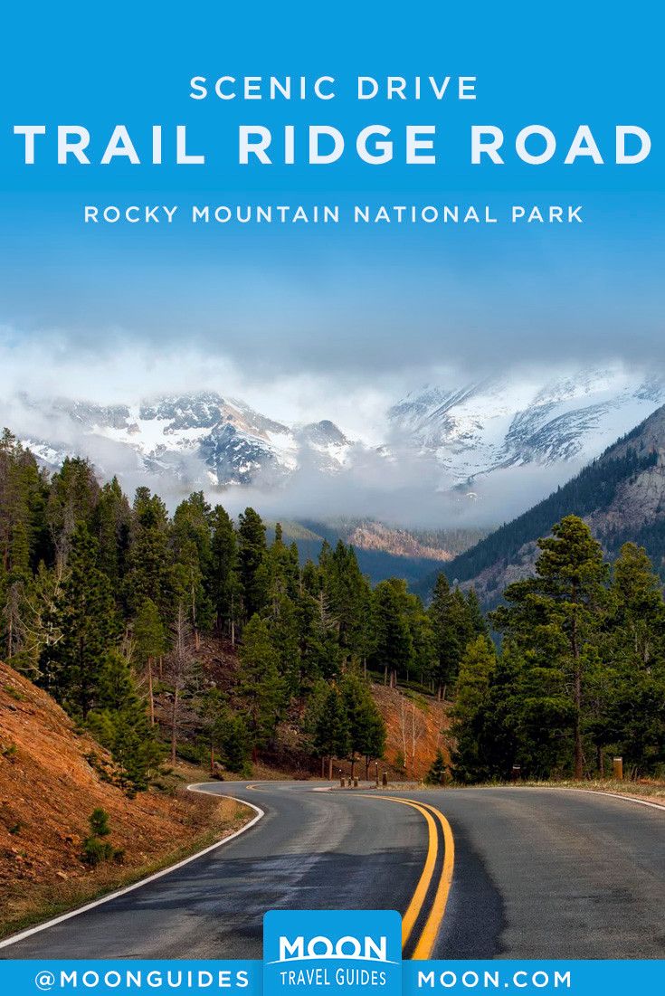 scenic drive trail ridge road rocky mountain national park with mountains in the background and blue sky