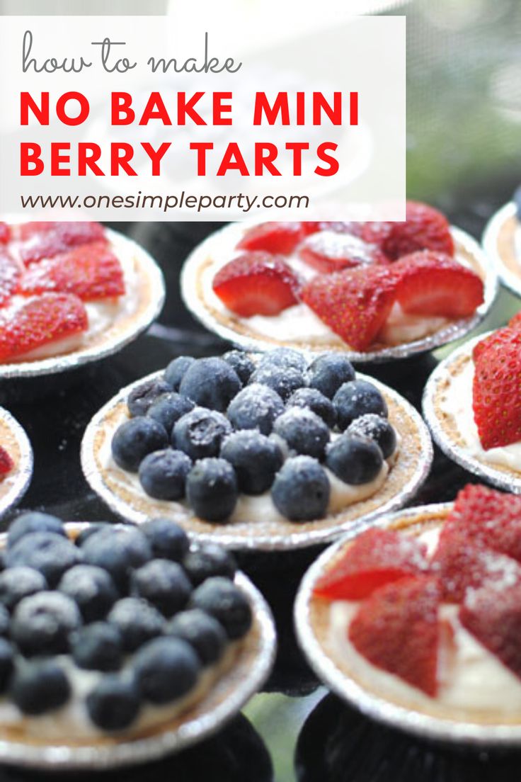 mini berry tarts with blueberries and strawberries on top