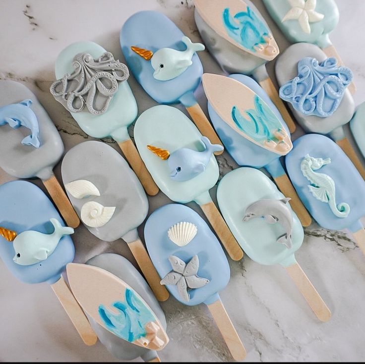 there are many cupcakes made to look like sea animals