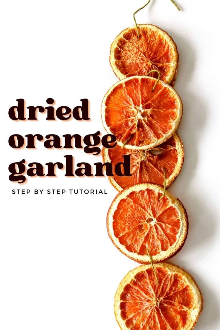 oranges arranged on top of each other with the words dried orange garland over them