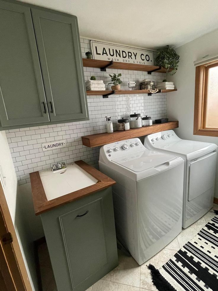 a washer and dryer in a small room