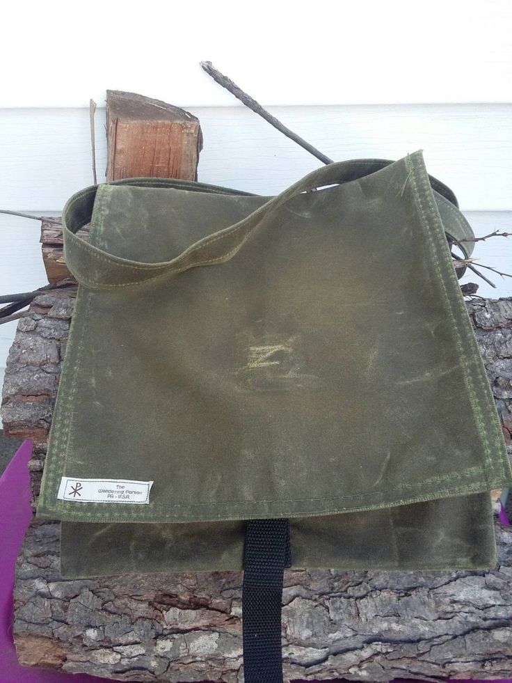 "This is a traditional haversack make with waxed OD green canvas. It's aprox. 12\"X12\" with a 60\" strap. This bag is great for around town trips as well as a multi-day trip into the bush. The canvas has been permeated with wax at the fabric mill so it is completely infused. This ensures that the bag will be water resistant and rugged enough for any adventure for years to come. comes with a 1\" fastex style closure to ensure the flap stays closed and tight. Waxed canvas has a long lifespan beha Military Style Durable Bag For Everyday Use, Durable Military Style Bag For Everyday Use, Green Rectangular Canvas Bag For Outdoor, Waxed Canvas Backpack Shoulder Bag For Outdoor, Rectangular Waxed Canvas Satchel For School, Green Outdoor Shoulder Satchel, Green Crossbody Satchel For Outdoor, Green Rectangular Satchel For Outdoor, Green Satchel Shoulder Bag For Outdoor