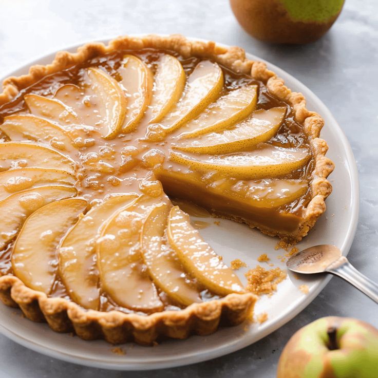 an apple pie with slices cut out on a plate