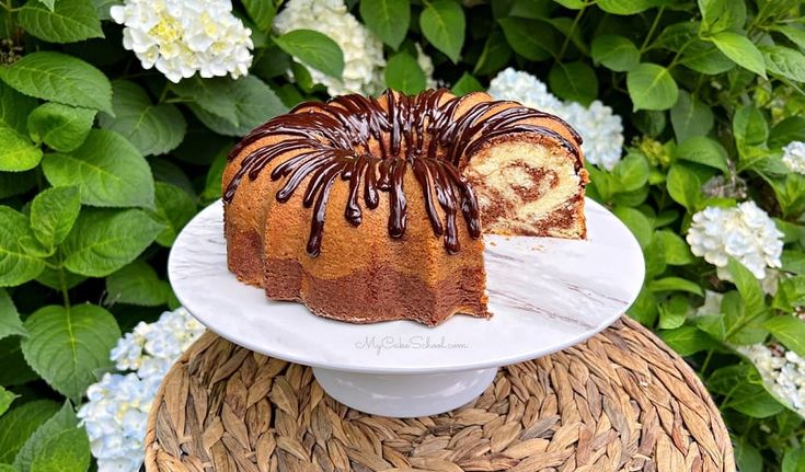 a bundt cake sitting on top of a white plate