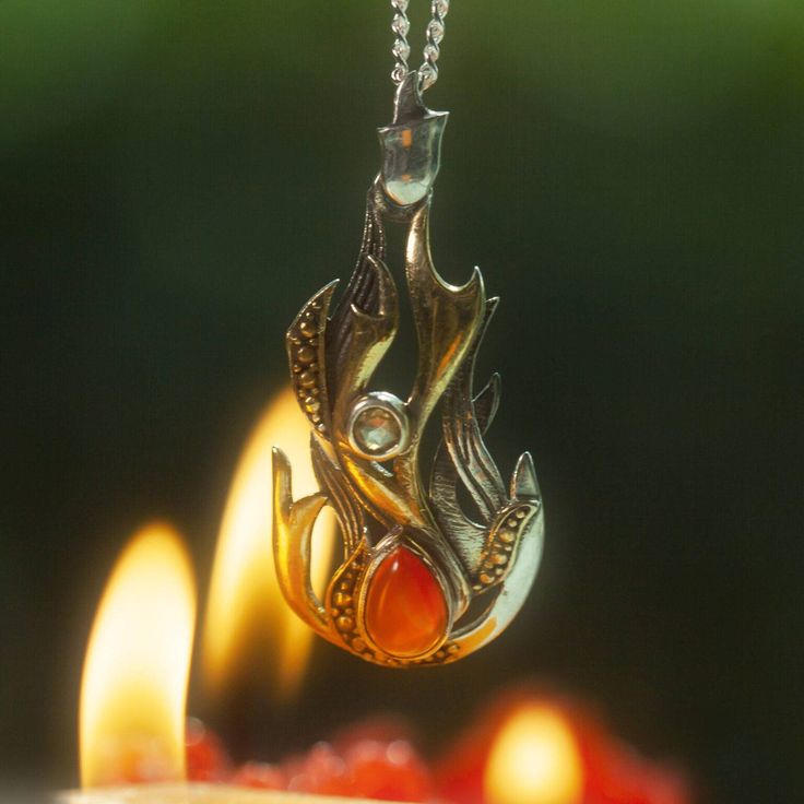 Beltane_flame_of_desire_pendant_1of3_5_1 Unique Amber Teardrop Jewelry, Unique Teardrop Amber Jewelry, Spiritual Amber Teardrop Jewelry, Spiritual Teardrop Amber Jewelry, Carnelian Gemstone Amulet Jewelry, Carnelian Gemstone Drop Jewelry, Carnelian Cabochon Pendant Jewelry, Silver Carnelian Teardrop Jewelry, Silver Teardrop Carnelian Jewelry