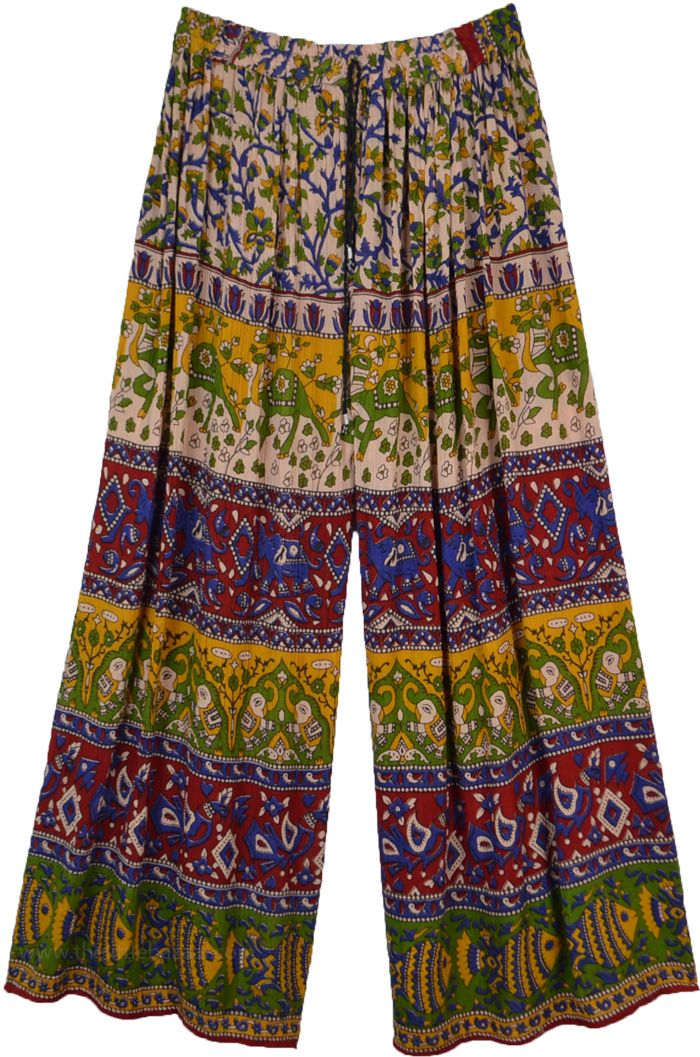 Boho streetwear pair of summer pants in beige, green, yellow, red and blue with a wide leg bottom, these elastic waist pants are lightweight.  These comfortable and loose-fit pants are ideal for lounge wear or yoga wear and just perfect for the beach. #tlb #SplitSkirtsPants #bohemianfashion #Streetwearpajamas #WideLegPants #BeachPants #Tribalbohopants Colorful Cotton Wide Leg Pants, Colorful Wide Leg Cotton Pants, Colorful Summer Cotton Pants, Colorful Cotton Summer Pants, Multicolor Wide Leg Pants For Summer, Casual Multicolor Harem Pants For Summer, Summer Multicolor Cotton Pants, Multicolor Cotton Pants For Summer, Multicolor Harem Pants For Spring Vacation