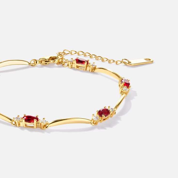 Elegant, unique & beautiful, this Amaranth Red Crystal Bracelet is the perfect statement bracelet to add to your jewelry collection. 18K gold plated, copper AAA cubic zirconia crystal Length: 6.3in (+ 1.6in adjustable) Hypoallergenic, lead & nickel free If you aren't in LOVE with your purchase, please let us know within 30 days of receiving your item, and you'll receive a stress-free refund. Elegant Red Bangle Gold Bracelet, Elegant Red Chain Bracelet For Gift, Elegant Red Gold Bangle Bracelet, Adjustable Yellow Gold Ruby Jewelry, Adjustable Elegant Ruby Bracelet, Elegant Red Chain Bracelet With Jubilee Design, Elegant Red Ruby Bracelets, Gold Cubic Zirconia Bracelet With Gemstone, Gold Cubic Zirconia Gemstone Bracelet