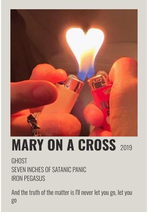 someone holding a lighter in their hand with the caption mary on a cross