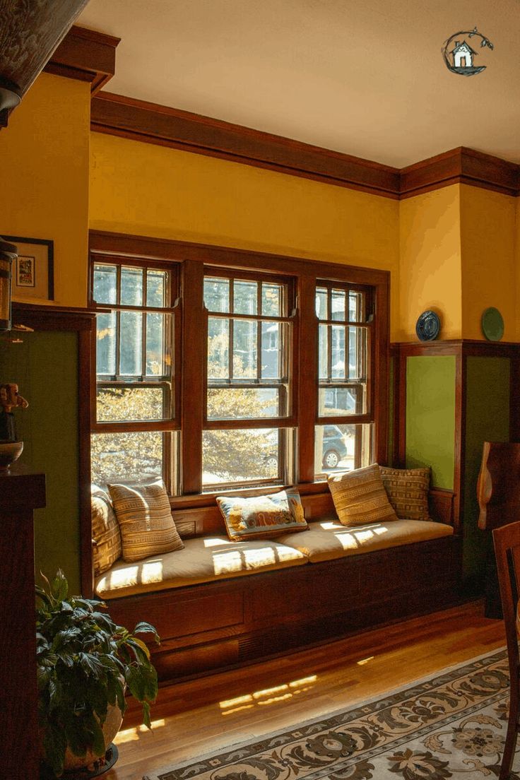 a living room filled with furniture and windows