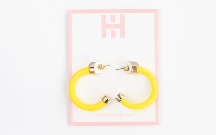 Add a pop of color to your wardrobe with our 1-inch Hoo Hoops! These hoops are the ultimate light weight statement earrings, perfect for all day wear. About Hoo Hoops: Hoo Hoops is a women-owned fashion jewelry brand with a focus on Hoop Earrings located in Nashville, Tennessee. Founder and Designer, Holly Hudson has always had an eye for hoop earrings and created this brand for people to have a go-to place to shop light-weight and colorful hoops. With two sizes and a wide variety of colors, there is a pair of Hoo Hoops for everyone. Details Acrylic Hoop Earrings Post Back Closure Measuring 1” in Diameter Color: Yellow Color may vary depending on device Photo Credits: Hoo Hoops Acrylic Hoop Earrings, Scout Bags, Soft Sock, Mini Hoop Earrings, Shop Light, Capri Blue, Jewelry Brand, Clear Bags, Sock Gifts