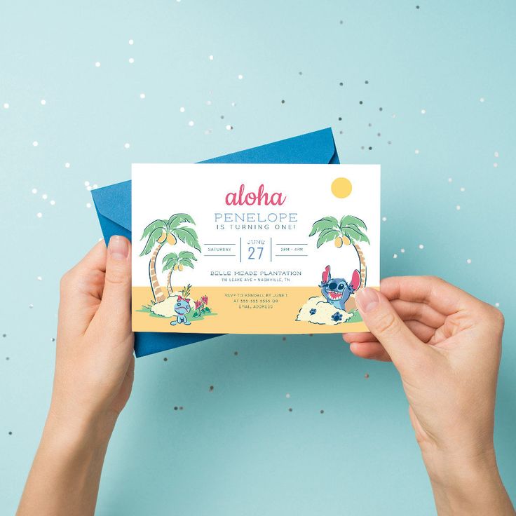 a person holding up a card with the words aloha on it and two cartoon animals